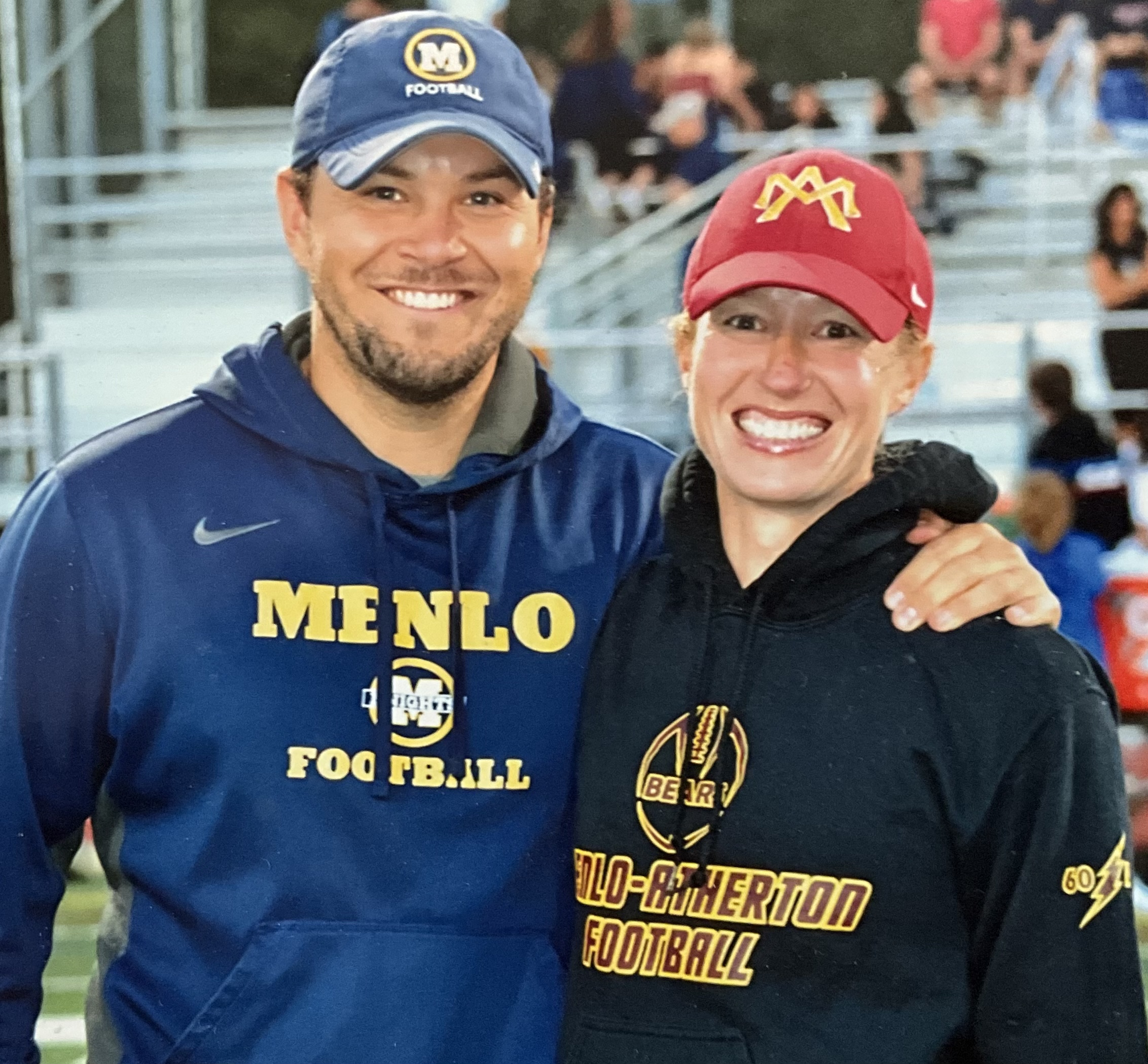 Vince Juarez and Maggie Dunlop-Juarez on the field